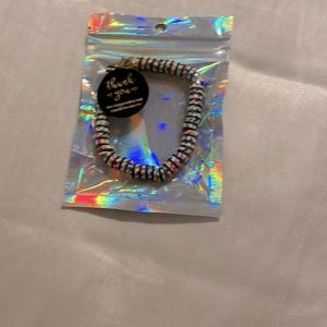 Bracelet with rainbow and black clay beads